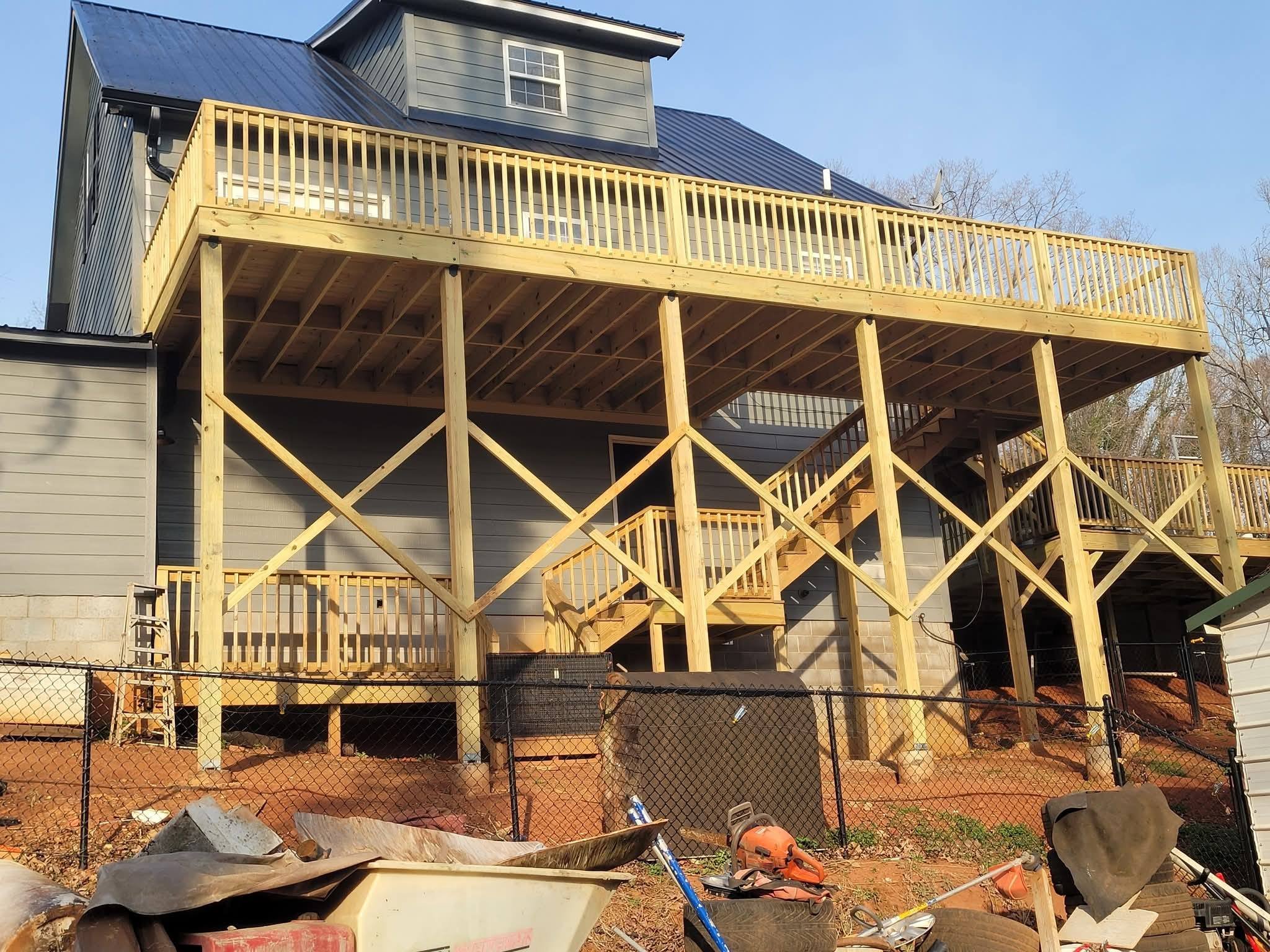 Elevated multi-level deck with X-brace framing